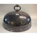 A large Victorian domed meat cover with engraved decoration, 51 x 39.5cm and a silver plated tray