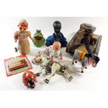 A collection of vintage toys including clockwork doll, frog, Muffin the Mule etc.