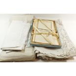 An embroidered linen table cloth and four linen table runners etc.