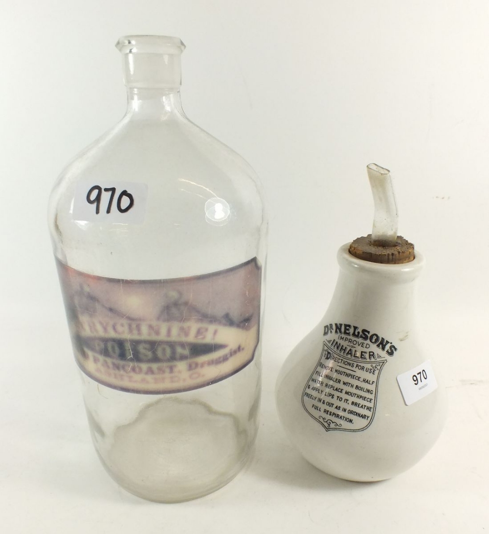A Nelsons Improved inhaler and a large glass poison bottle