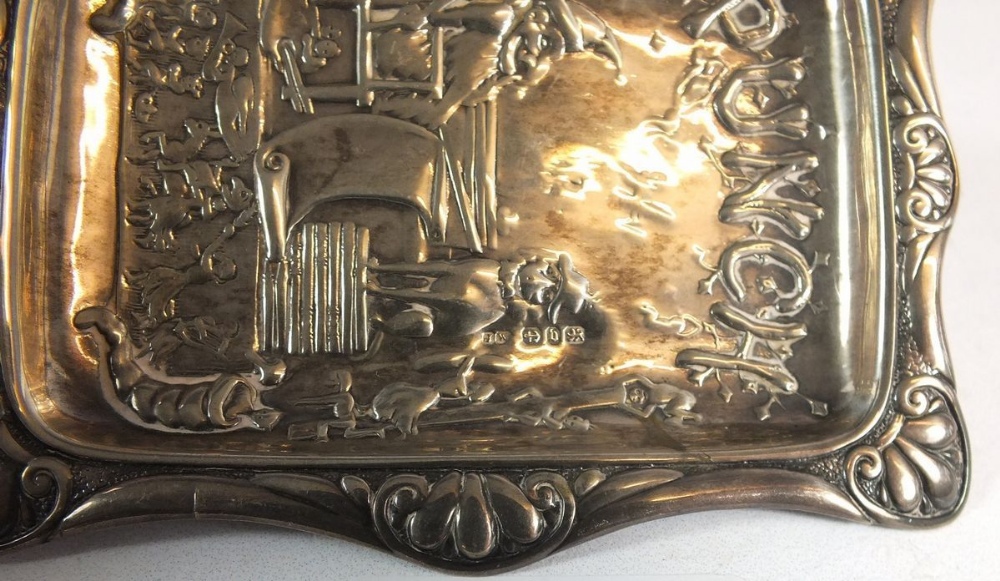 A Punch silver pin tray embossed Mr Punch and his dog, 10 x 7cm, 31g, Birmingham 1876 maker JW - Image 2 of 2