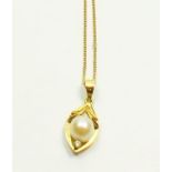 An 18 carat gold and pearl pendant on 18 carat gold chain, total weight 3.5g