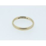 A 9 carat gold wedding band, size N/O