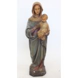 A large continental painted plaster figure of Madonna and Child, 71cm