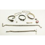 A collection of silver jewellery items to include a vintage silver hinged bangle, two antique silver