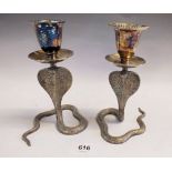 A pair of cobra silver plated candlesticks, 15cm high