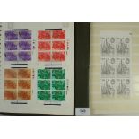 GB: 2 stock-books of QEII mint pre-decimal & decimal defin & commem from 1969 on. Mostly blocks of 6