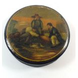 A Victorian papier mache snuff box painted man with fishing reel