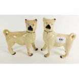 A pair of 19th century pottery pug dogs, a/f - 15cm