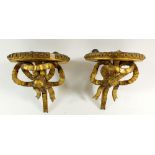 A pair of Victorian gilt wood ribbon form wall brackets, 14cm