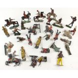 A quantity of Victorian lead toy soldiers including Britains - cowboys, knights, guardsmen etc.