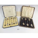 Two sets of silver coffee spoons with bean terminals, cased, Mappin & Webb 1933 and Birmingham 1929