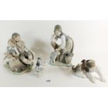 Four Lladro figurines: girl petting a dog, a young boy and girl sat with dog, a dog and butterfly