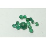 A group of 5 carats of mixed emeralds