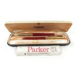 A Parker 61 fountain pen boxed and a biro