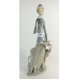 A large Lladro figure of a woman with deer, 45cm tall
