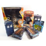 A Dr Who Tardis talking money box, a radio control Dalek, a Dr Who car, phone box, tins etc.