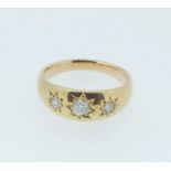 An 18 carat gold gypsy style diamond ring, 5.2g, size O/P