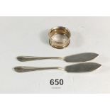 A pair of silver butter knives and a small silver napkin ring, 23.6g