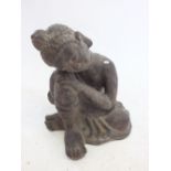 A plaster figure of a sleeping Buddha (a/f), 37cm