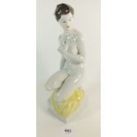 A Kezzel Festett figurine of a nude female kneeling, approx 29.5cm high