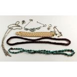 A garnet necklace, turquoise necklace, four silver chains, paste and various other costume jewellery