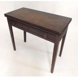 A Georgian mahogany fold top card table on square supports, 81 x 31cm