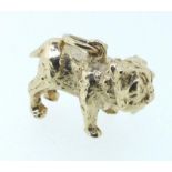 A 9 carat gold charm in the form of a bull dog, unmarked but tested, 7g,