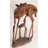 An African large carved wood antelope with foal, 90cm tall