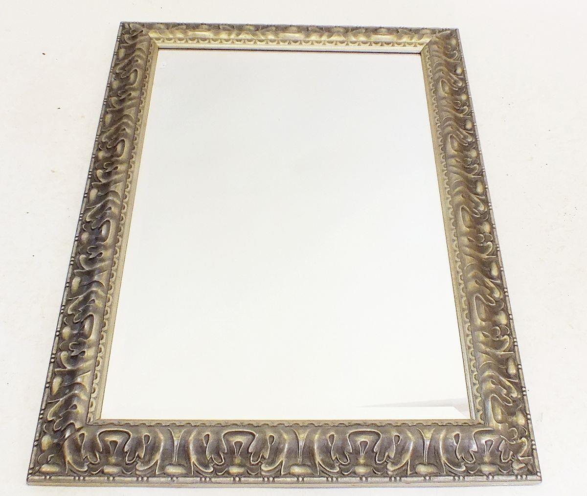A silvered framed mirror, 90 x 66cm