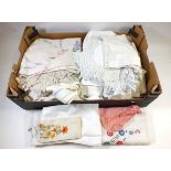 A box of table linen with embroidered and crochet decoration