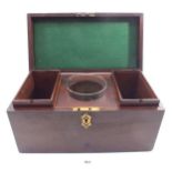 A Victorian mahogany tea caddy with brass handle, fitted two interior boxes and a glass mixing bowl,