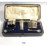 A three piece cruet set, boxed, Birmingham 1922