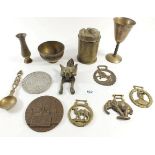Various brassware including horse brasses, fox door knocker etc.