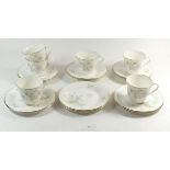 A Royal Doulton 'Flirtation' tea service comprising: six cups and saucers and six tea plates