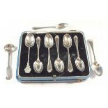 A set of six silver teaspoons cased and three other spoons