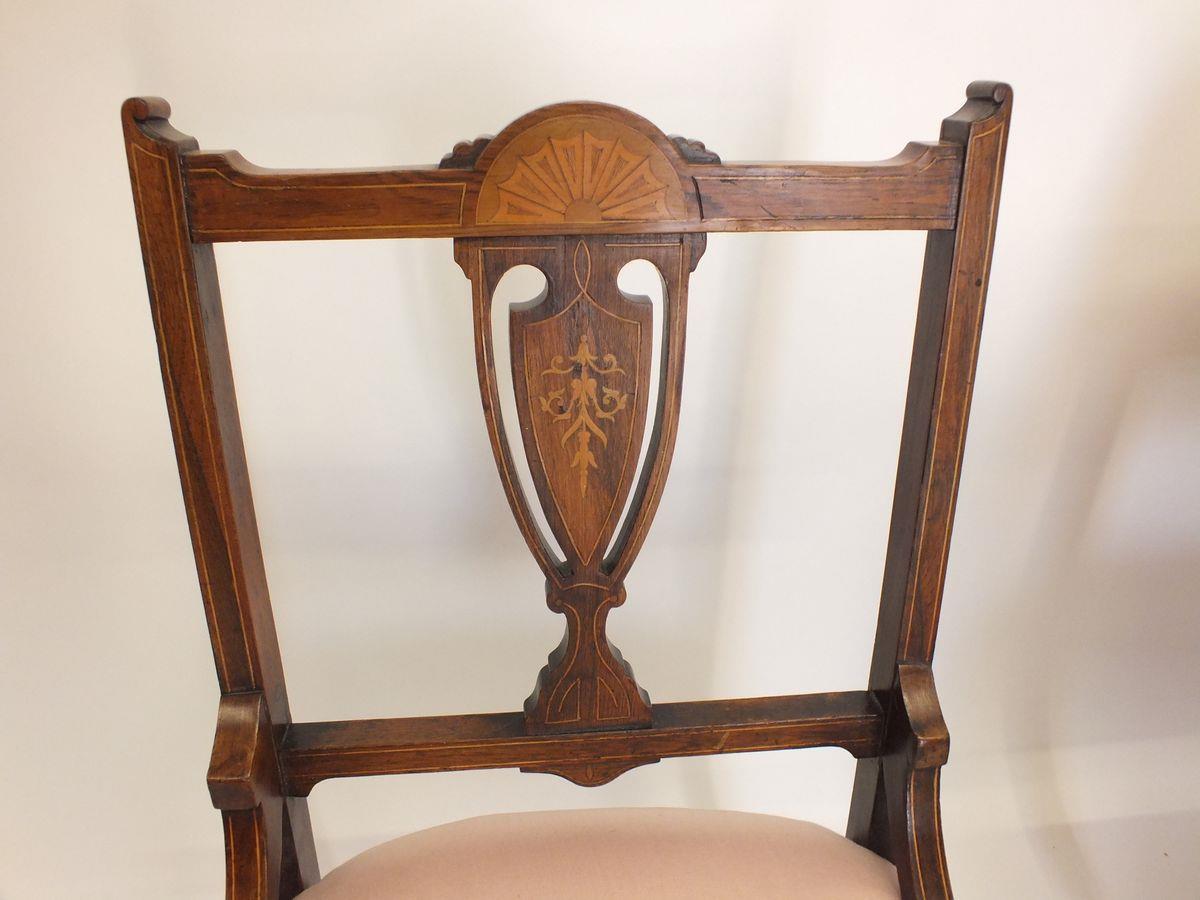 An Edwardian salon suite with marquetry decoration comprising: settee, two side chairs and armchair - Image 5 of 5