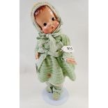 An Effanbee Patsy doll with composition body, in green knitted dress, circa 1935, 34cm