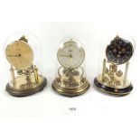 Three tortion anniversary clocks