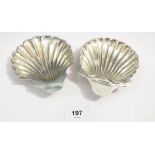 Two silver shell form butter dishes, London 1894 and 1899