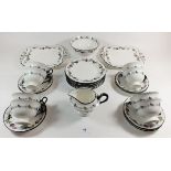 A Shelley vintage tea service printed roses comprising: eight cups and saucers, eight tea plates,
