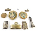 Five antique/vintage small chocolate moulds, a brass compact, a mini Lourdes souvenir notepad and