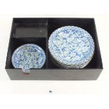 A Chinese 20th century set of five blue and white saucers and four pin dishes