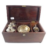 A 19th century tea caddy with fitted interior including two silver plated on copper mixing bowls and