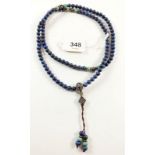 A lapis lazuli turquoise and white metal bead necklace