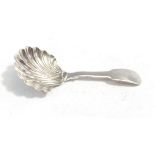 A silver Georgian shell form caddy spoon