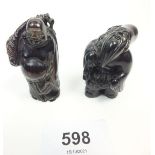 Two Japanese carved wood netsuke of men