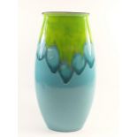 A large Poole vase painted in blue and green, 37cm, boxed