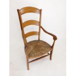 A light wood slat back country chair with rush seat, 97cm high, 55.5cm wide