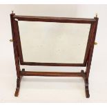 An Edwardian mahogany swing toiletry mirror